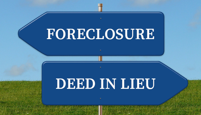 Road signs pointing two ways: foreclosure or deed in lieu